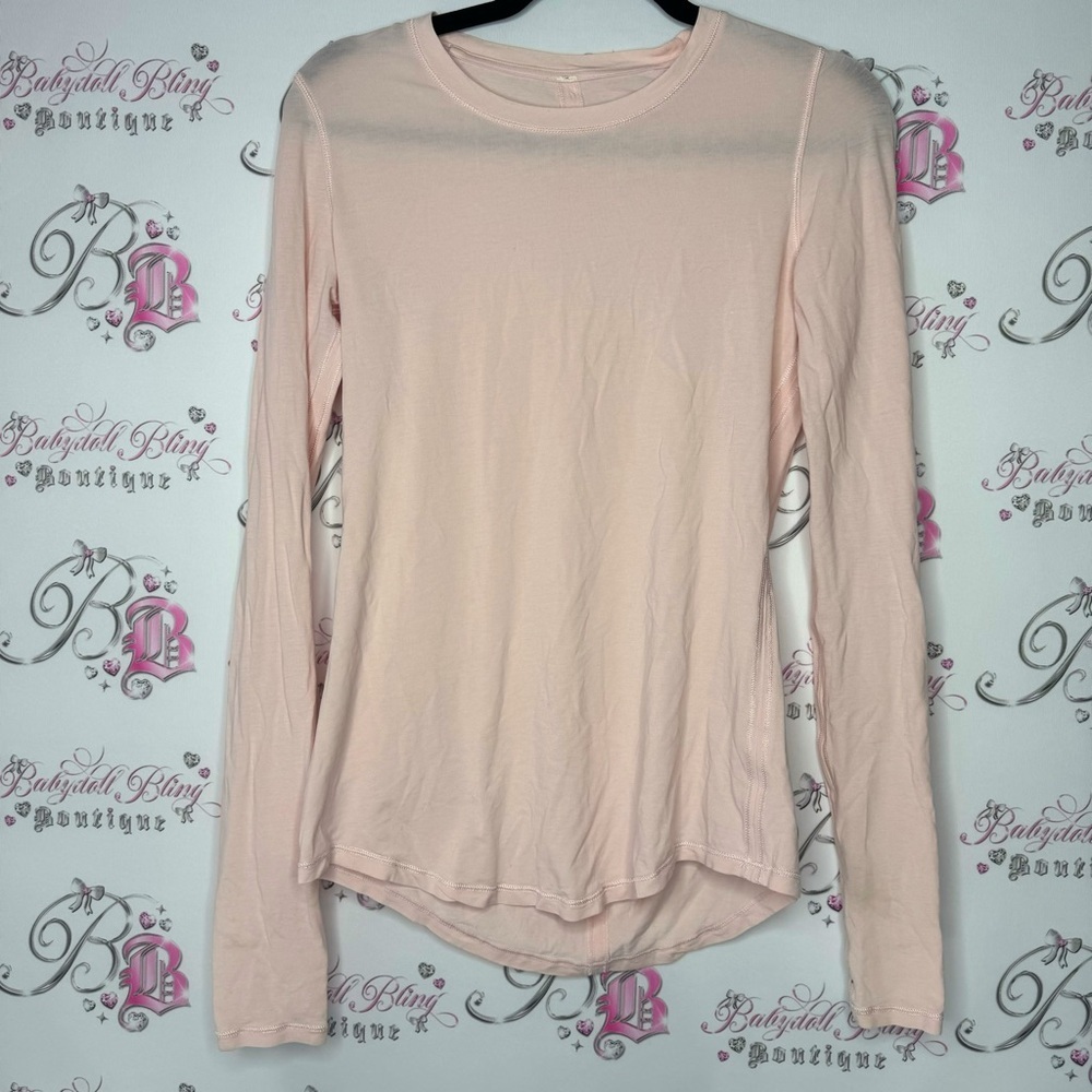 Lululemon long sleeve stretchy pink top logo on back soft buttery workout yoga